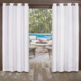 Exclusive Home Miami Semi-Sheer Textured Indoor/Outdoor Grommet Top Curtain Panel, 54″x120″, Winter White, Set of 2